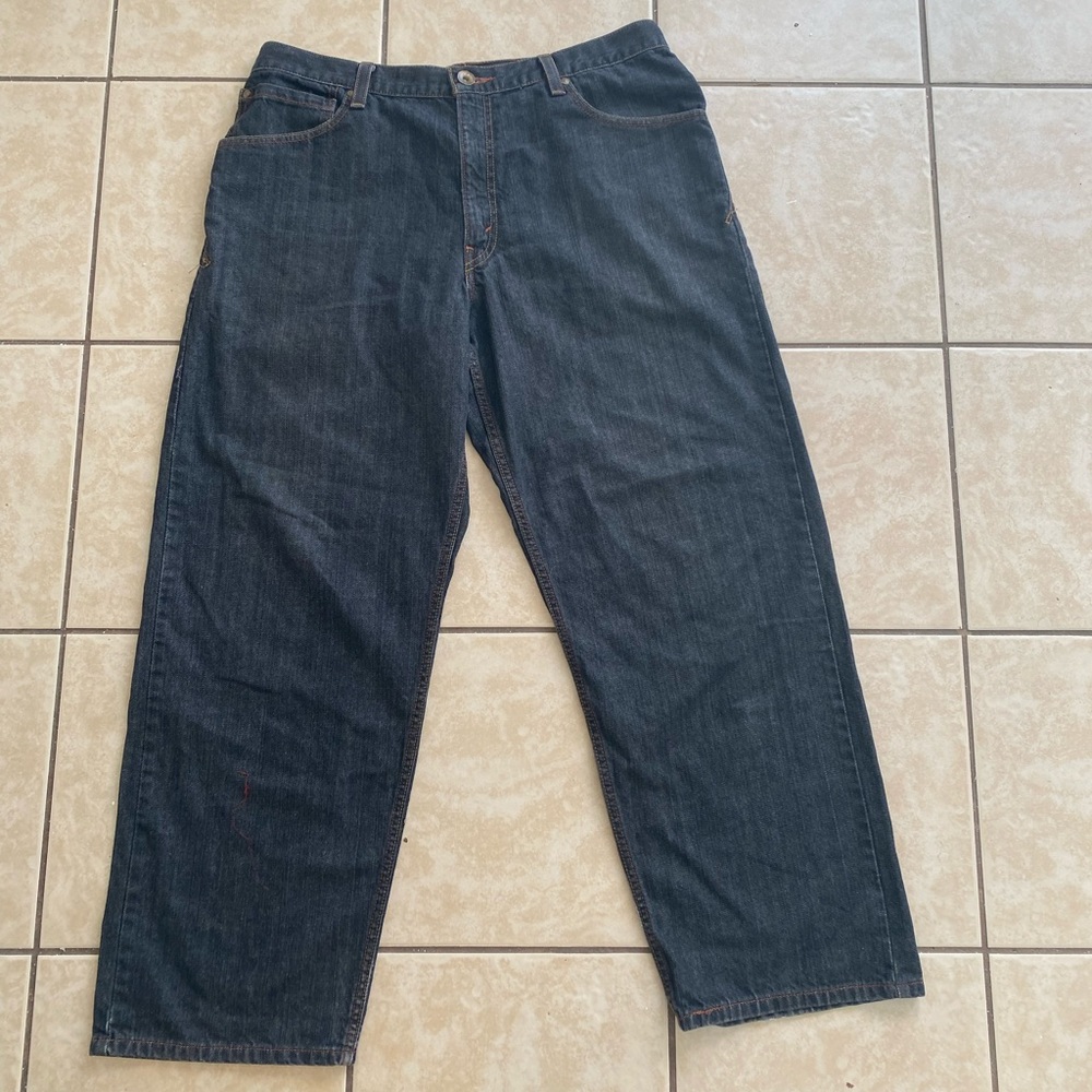 Not authentic silver tabs ~baggy dark blue jeans